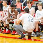 Coupeville coach Brad Sherman talks to Jean Lund-Olsen (4) in Fridays showdown with South Whidbey.(Photo by John Fisken)
