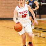 Anya Leavell advances the ball for the Wolves.(Photo by John Fisken)