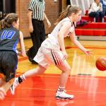 Izzy Wells starts the Coupeville break ahead of South Whidbeys Bella Pierce (10).(Photo by John Fisken)