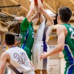 Oak Harbors Haven Brown, right, battles Shorewoods Spencer Osborn for a rebound. (Photo by John Fisken)