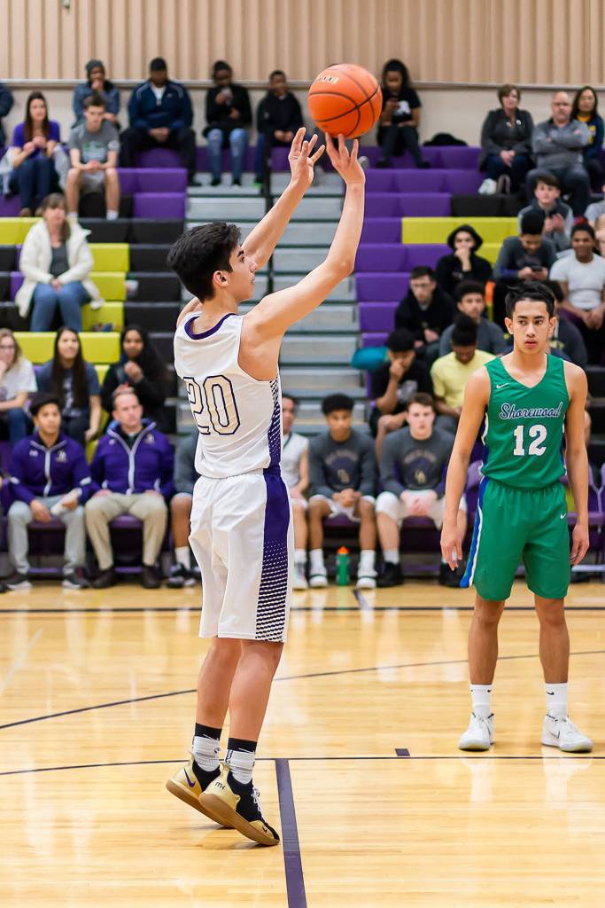 Matt Kelley hits a clutch free throw for the Wildcats.(Photo by John Fisken)