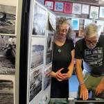 Orca Networks Susan Berta and Howard Garrett have led the fight to return Lolita to her home waters of Puget Sound. In August 2018, they set up an educational display about the killer whale round-ups on Coupeville wharf before leading a commemorative ceremony honoring captured and deceased orcas. (Photo by Patricia Guthrie/Whidbey News Group)