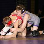 Shamus Warden, right, attempts to break down M-Ps Tanner Lauzon.(Photo by John Fisken)