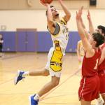 Haven Brown flies to the hoop for Oak Harbor.(Photo by John Fisken)