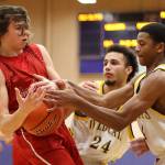 Wildcats begin postseason push with win / Boys basketball