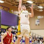 Evan Nadeau scores one of his back-to-back buckets in the third quarter.(Photo by John Fisken)