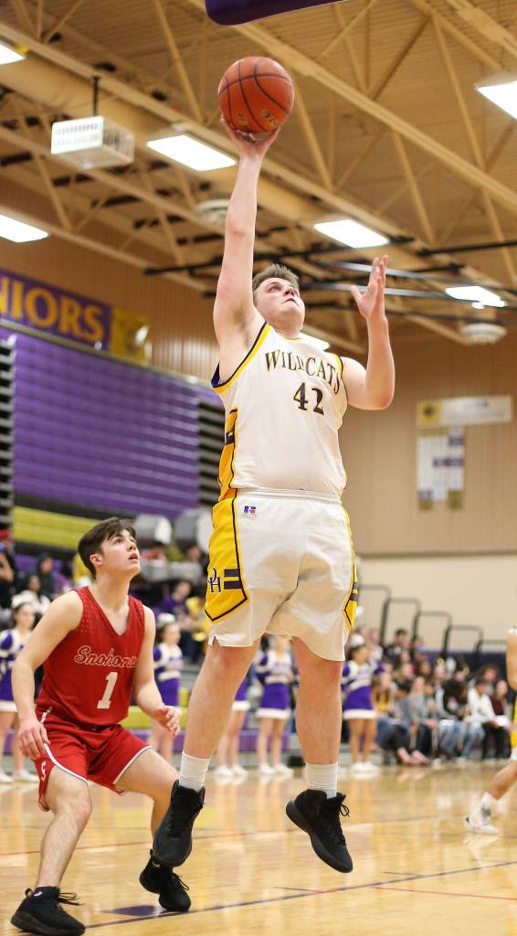 Evan Nadeau scores one of his back-to-back buckets in the third quarter.(Photo by John Fisken)