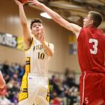 Rylee Simmons, left, slips the ball past Snohomishs Kolton Smith.(Photo by John Fisken)