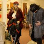 Margo and Darrin Hutchinson Jr. try on donated coats after having a meal Thursday at Island Church of Whidbey in Langley. The church was the hub for South Whidbey Point in Time count activities. (Photo by Patricia Guthrie/Whidbey News Group)                                Photo by Laura Guido/Whidbey News-Times