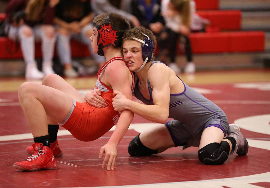 Shamus Warden, right, hangs on for a 10-5 win.(Photo by John Fisken)