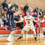 Mason Grove, right, applies pressure during Coupevilles press.(Photo by John Fisken)