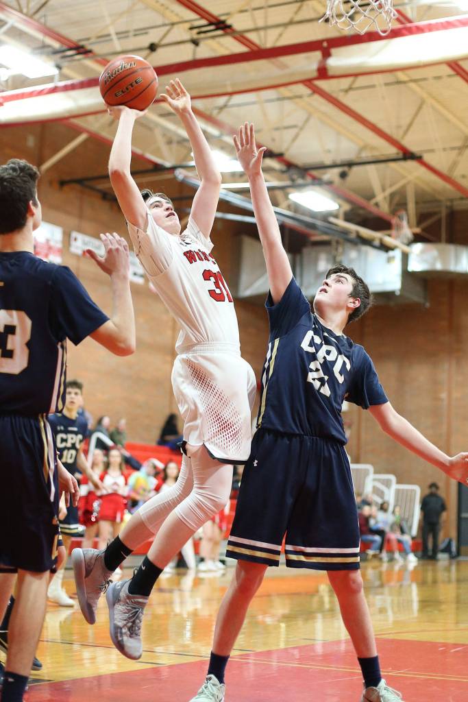 Coupevilles Ulrik Wells goes on the attack.(Photo by John Fisken)
