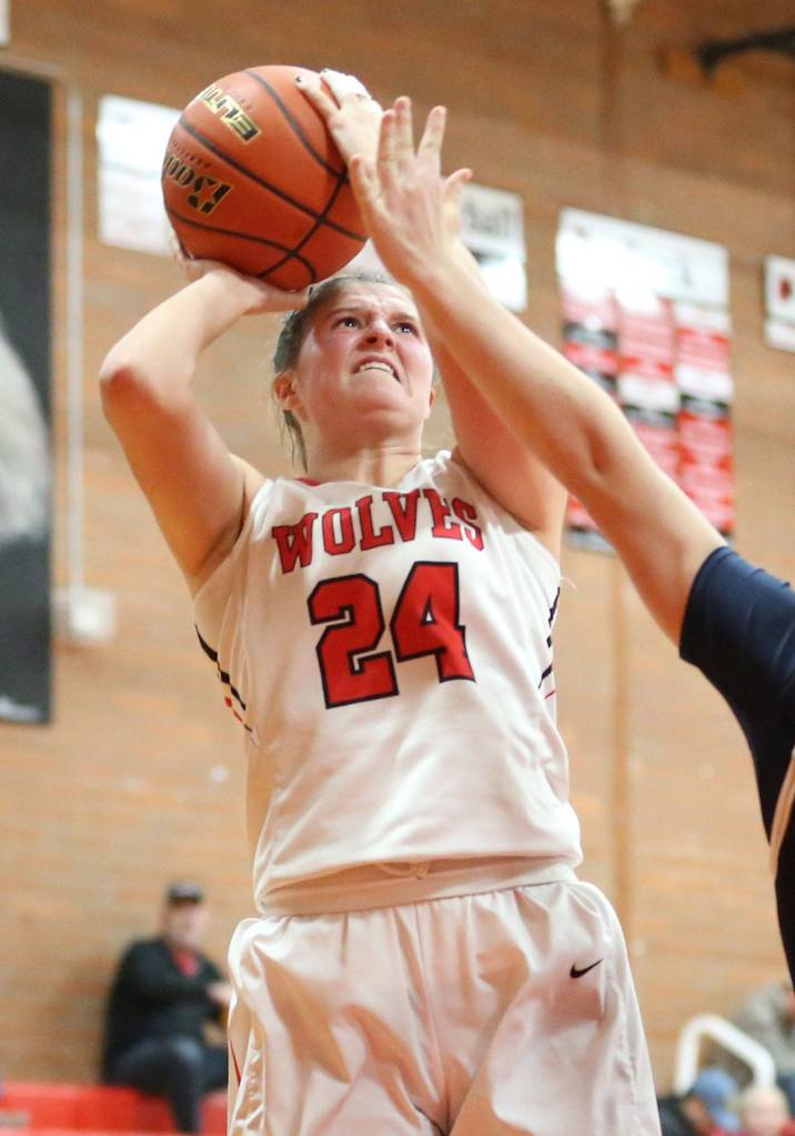 Lindsey Roberts powers up a shot against Cedar Park.(Photo by John Fisken)