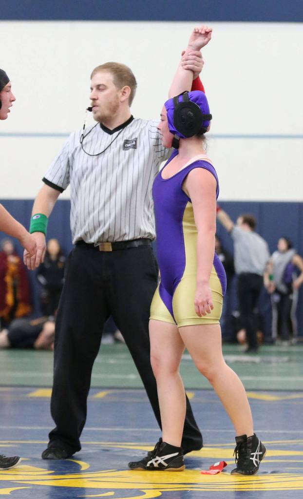 Nicole Sipes is declared the winner over Mount Vernons Ginger Syckoff.(Photo by John Fisken)