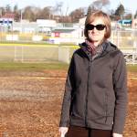 Ellen White, a fundraising chairwoman for the Bailey Johnson Playground Improvement Committee, stands in front of the land that will be used for the updated playground commemorating Bailey Johnson. Photo by Laura Guido/ Whidbey News-Times
