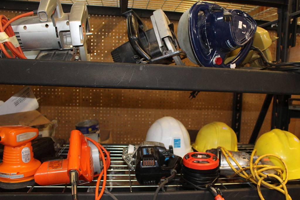 Among the many construction and home improvement items for sale at the Freeland Habitat for Humanity store are hardhats and a variety of power tools.