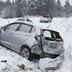 A collision occurred Monday morning as a car slid into Highway 20 from Race Road in Central Whidbey. An oncoming pickup on the highway struck the car, causing it to go into a ditch. No injuries were reported at the incident. Photo by Laura Guido/Whidbey News Group