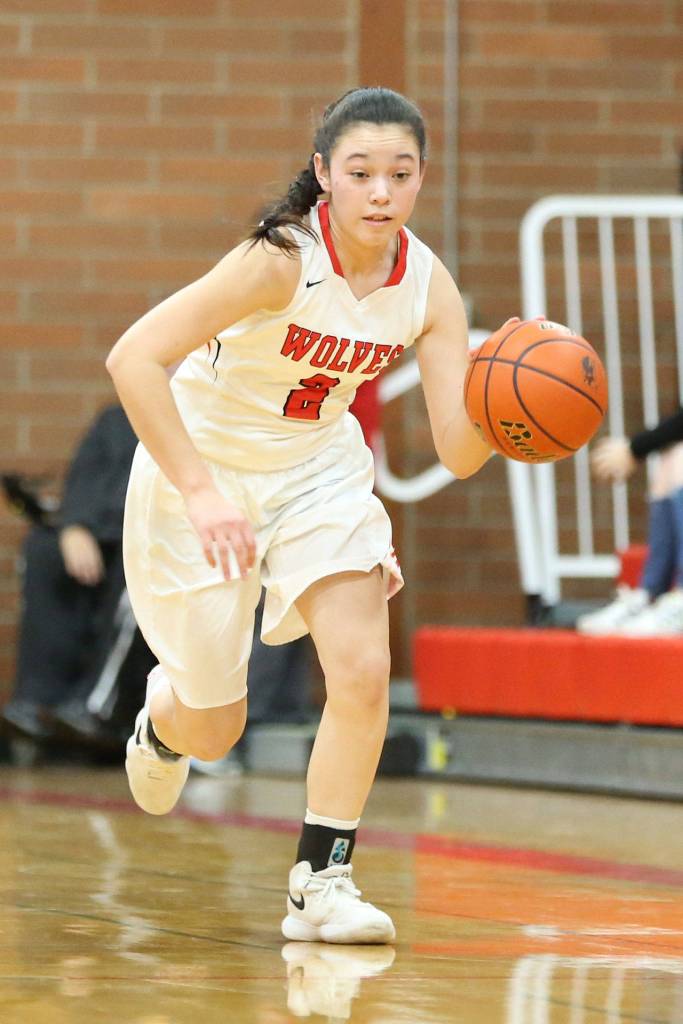 Scout Smith hustles the ball up the floor for Coupeville.(Photo by John Fisken)