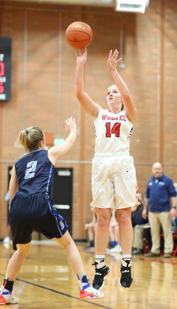 Ema Smith puts up a jumper for Coupeville.(Photo by John Fisken)