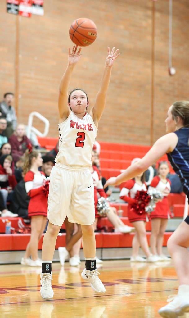 Scout Smith launches a three-point shot in the win over Sultan. (Photo by John Fisken)