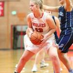 Hannah Davidson looks to outlet after grabbing a rebound. (Photo by John Fisken)
