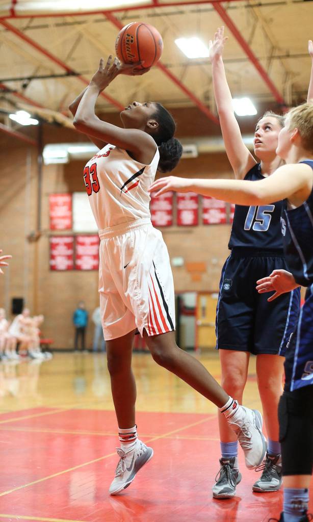 JaKenya Hoskins looks to score for the Wolves.(Photo by John Fisken)