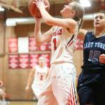 Chelsea Prescott takes the ball to the basket for Coupeville.(Photo by John Fisken)