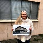 Vivian Rogers Decker shows off the plans.