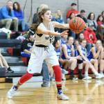 Ryanne Knoblich fires a pass for the Wolves.(Photo by John Fisken)