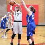 Carolyn Lhamon puts up a shot for Coupeville.(Photo by John Fisken)