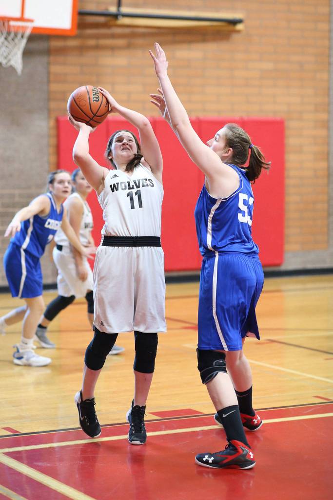 Carolyn Lhamon puts up a shot for Coupeville.(Photo by John Fisken)