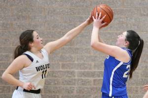 Photos: Wolves rally for win / Middle school girls basketball