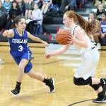 Maddie Georges, right, tries to beat a South Whidbey defender.(Photo by John Fisken)