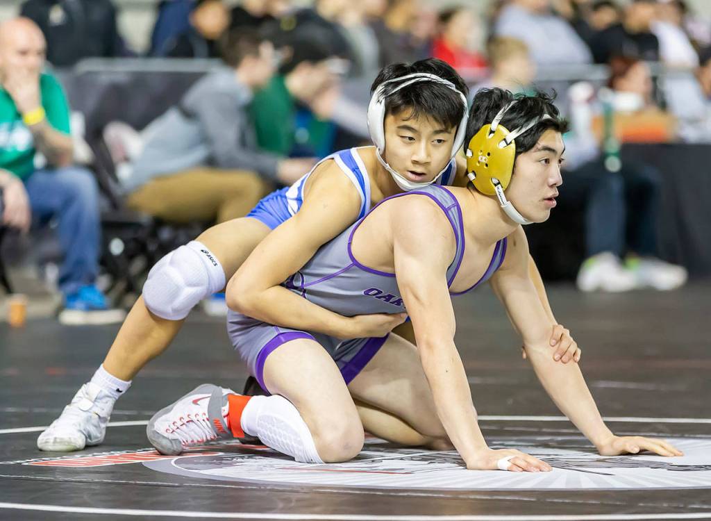 Oak Harbors Jakob Dailey, right, and Mountain Views Kevin Chen.(Photo by John Fisken)