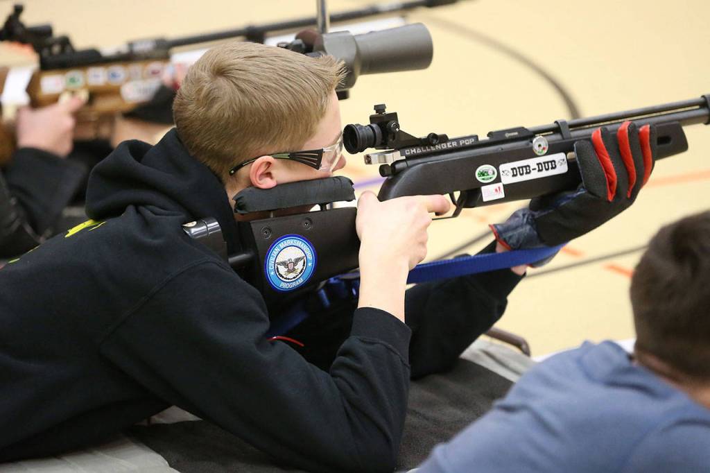 Trevor Westman takes aim for the Oak Harbor sporter rifle team.(Photo by John Fisken)