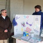 Kate Mistler, right, and Kristi Lovelady stand outside Walmart Tuesday to collect bras, tampons and sanitary pads for local women in need. Mistler is working to bring the organization I Support the Girls to Whidbey Island to ensure the effort is ongoing. Photo by Laura Guido/Whidbey News Group