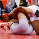 Oak Harbor graduate Jeremy Vester, top, goes for a pin this season while competing for Central College. (Photo by Dan L. Vanderbeek)