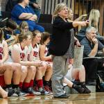 Amy King directs her team during a junior varsity game last season. (Photo by John Fisken)