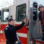 Conor Park, age 7, was excited to see a real firetruck. (Photo by Maria Matson/Whidbey News -Times)