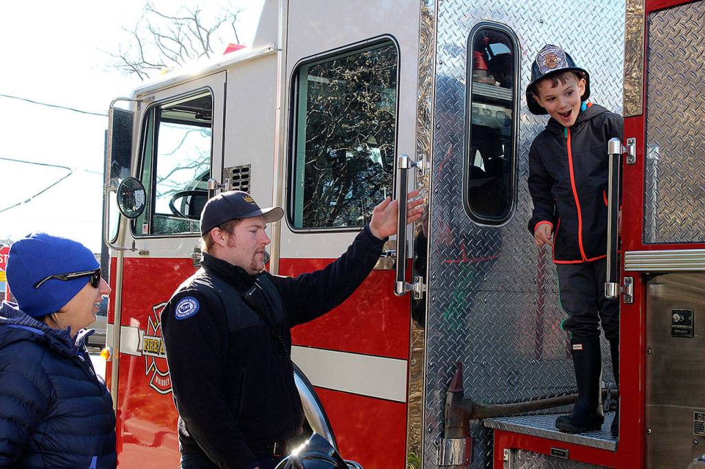 Conor Park, age 7, was excited to see a real firetruck. (Photo by Maria Matson/Whidbey News -Times)
