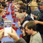 Rawle Jefferds of Penn Cove Shellfish made sure participants ate every last mussel before they could claim the crown. (Photo by Maria Matson/Whidbey News -Times)