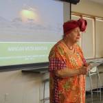 Milli Stanton gives her presentation as novel laureate and Peace Prize winner Wangari Muta Maathai.                                 (Photo by Maria Matson/Whidbey News-Times)