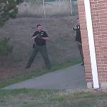 Police photo                                A still from an officers dashcam video shows the moments before Richard Jackson is shot. Deputy Shawn Engert is at left and Officer Patrick Horn can be partially seen at the right.