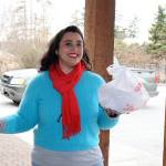 Crystal Aguilar, owner and founder of Whidbey Waiter, makes a delivery at a Coupeville office. Her business also delivers groceries, flowers, takes trash to the dump and makes Costco runs for its customers.Photo by Laura Guido/Whidbey News Group