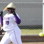 Oak Harbor Tamara Bennett tries to avoid being hit by a Lakewood pitch. (Photo by John Fisken)