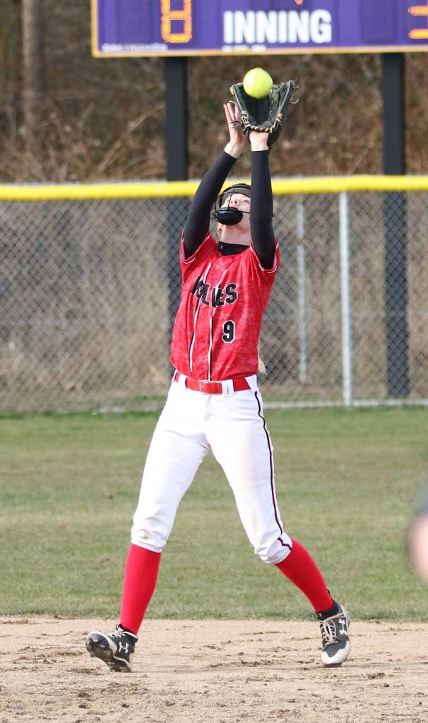Coupevilles Chelsea Prescott looks in a pop-up in the Oak Harbor game.(Photo by John Fisken)
