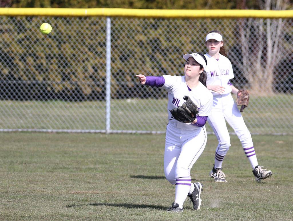 Rinka Tsutsumi tosses the ball back into the infield against Lakewood.
