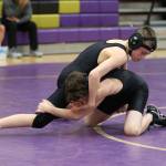 Brody Snyder takes on teammate Josiah Christopherson. (Photo by John Fisken)