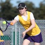 Sierra Brackeen returns a shot in second singles. (Photo by John Fisken)