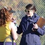 Oak Harbor coach Malia Turner, right, discusses strategy with Annie Salinger.(Photo by John Fisken)